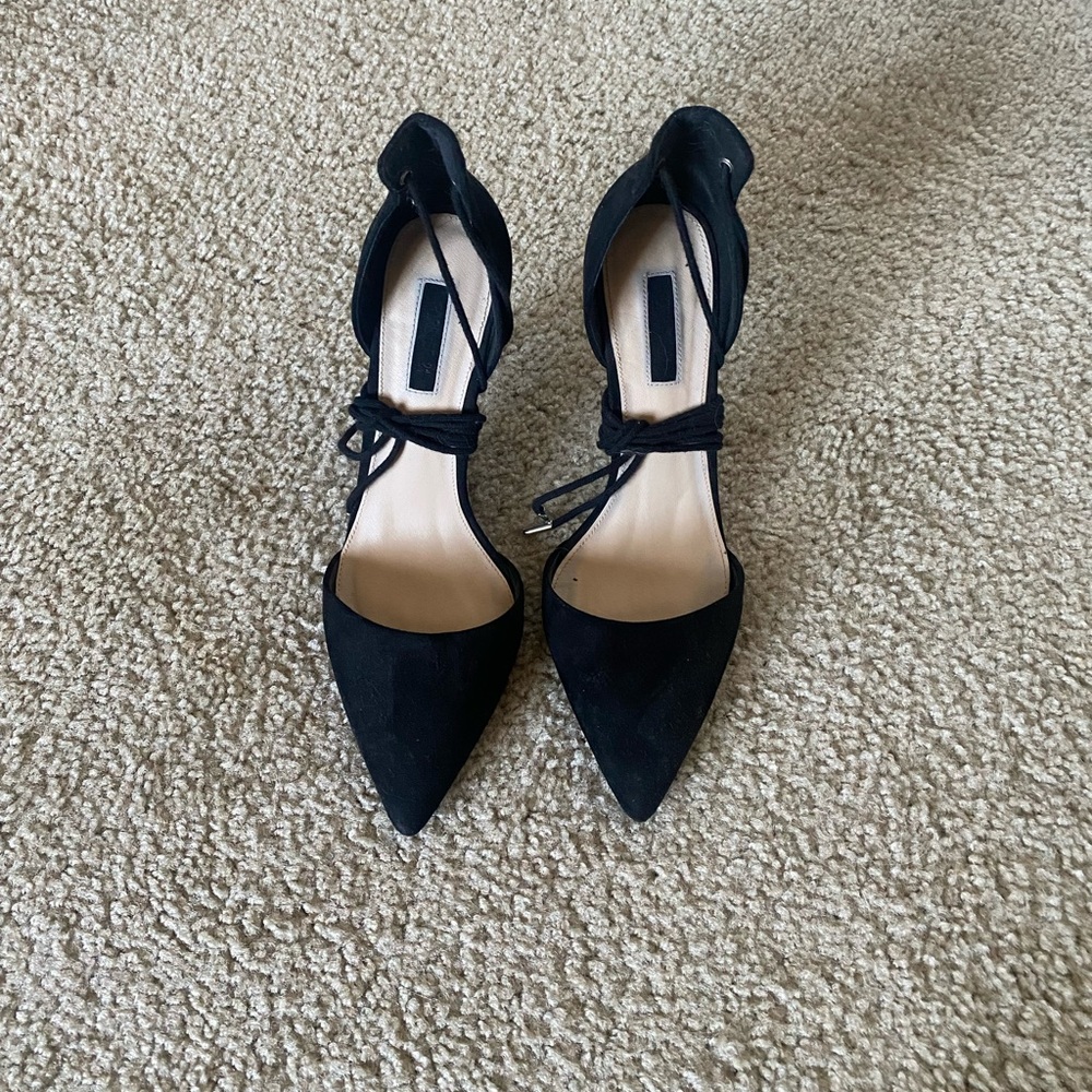 Black lace up heels; pointed toe; worn once